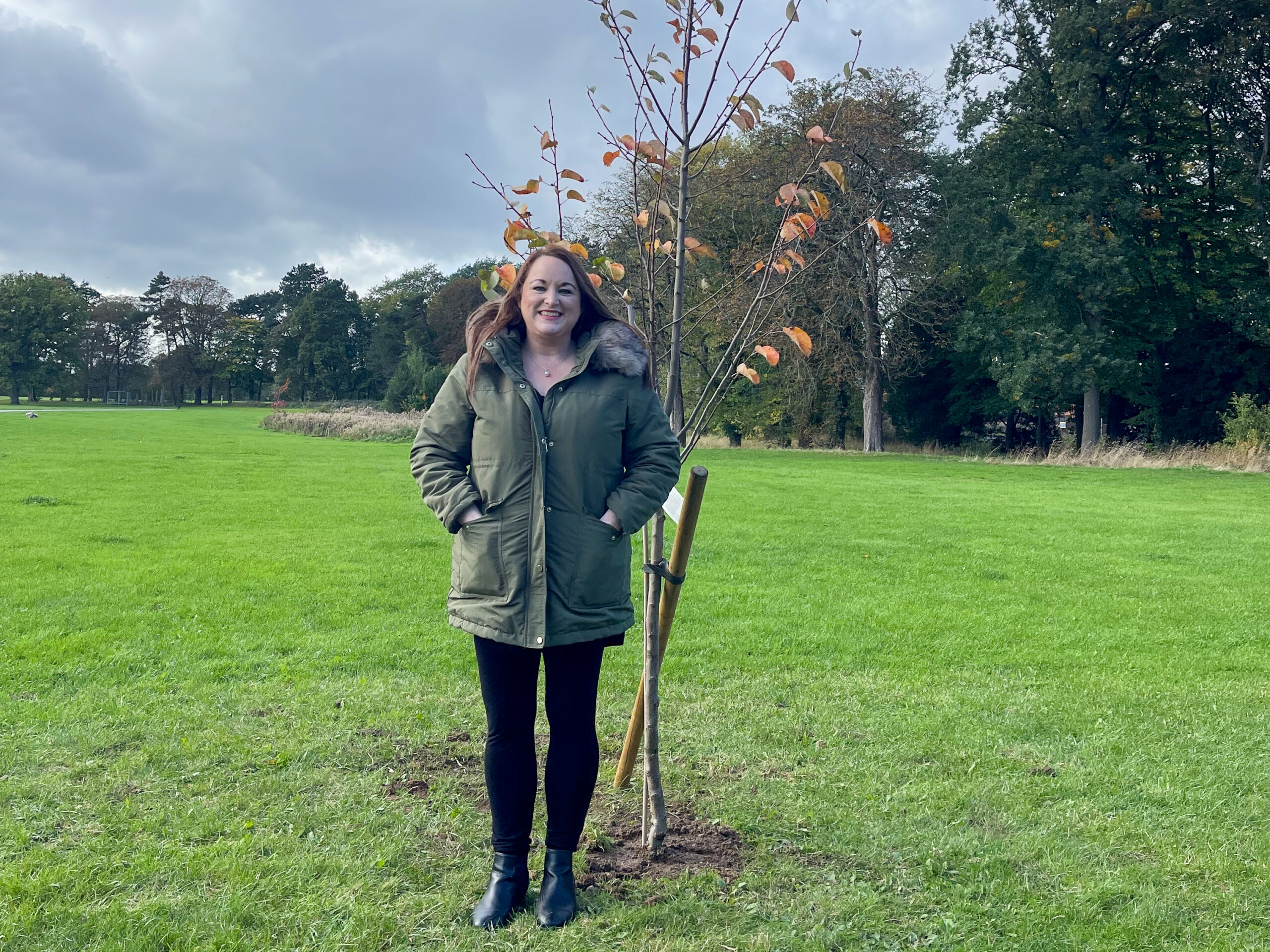 Lyndsay Hogg stood beside her tree