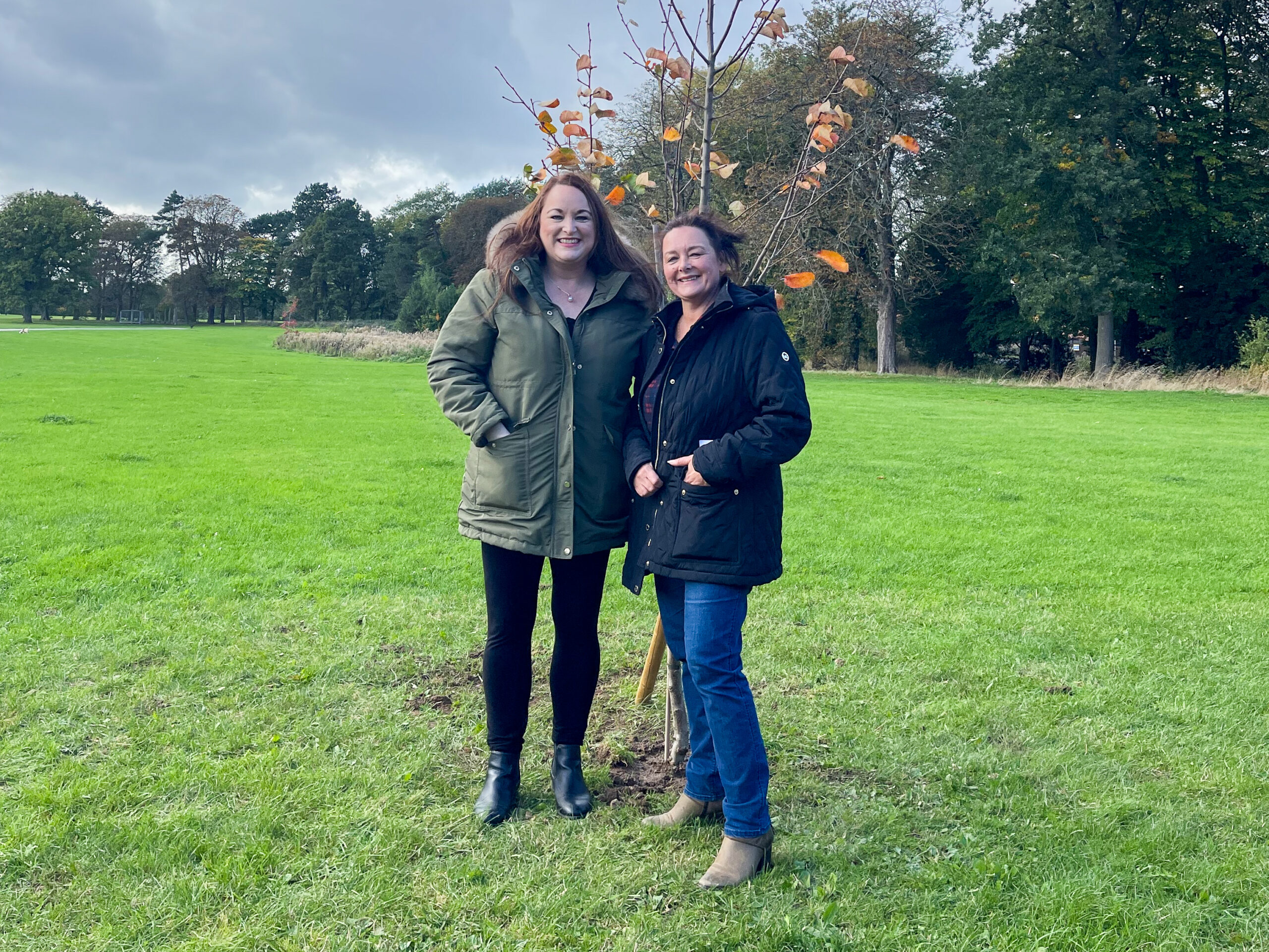 Lyndsay Hogg stood with Ann Stonehouse infront of Lyndsay's tree at the Sisterwood